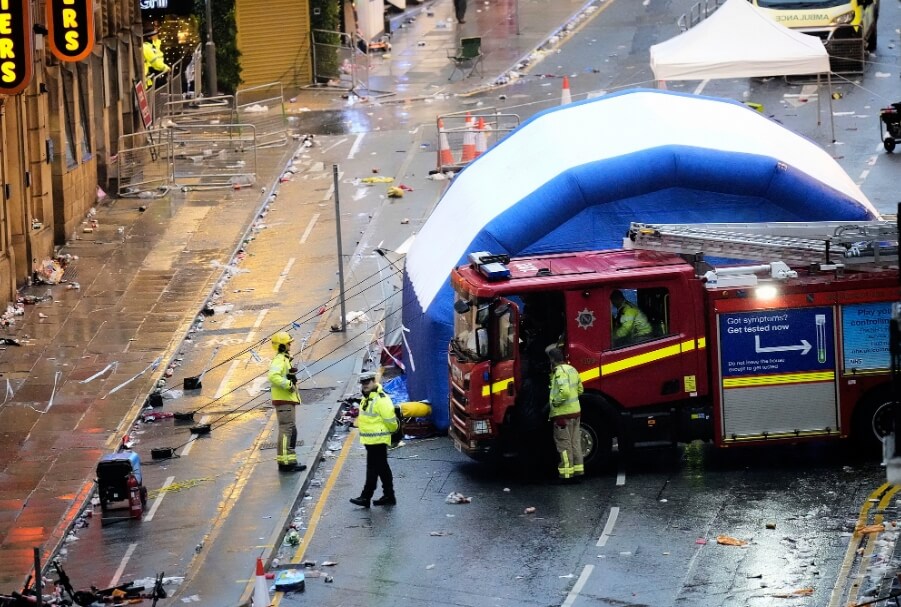 Dozens injured after car plows into crowds at Liverpool title parade
